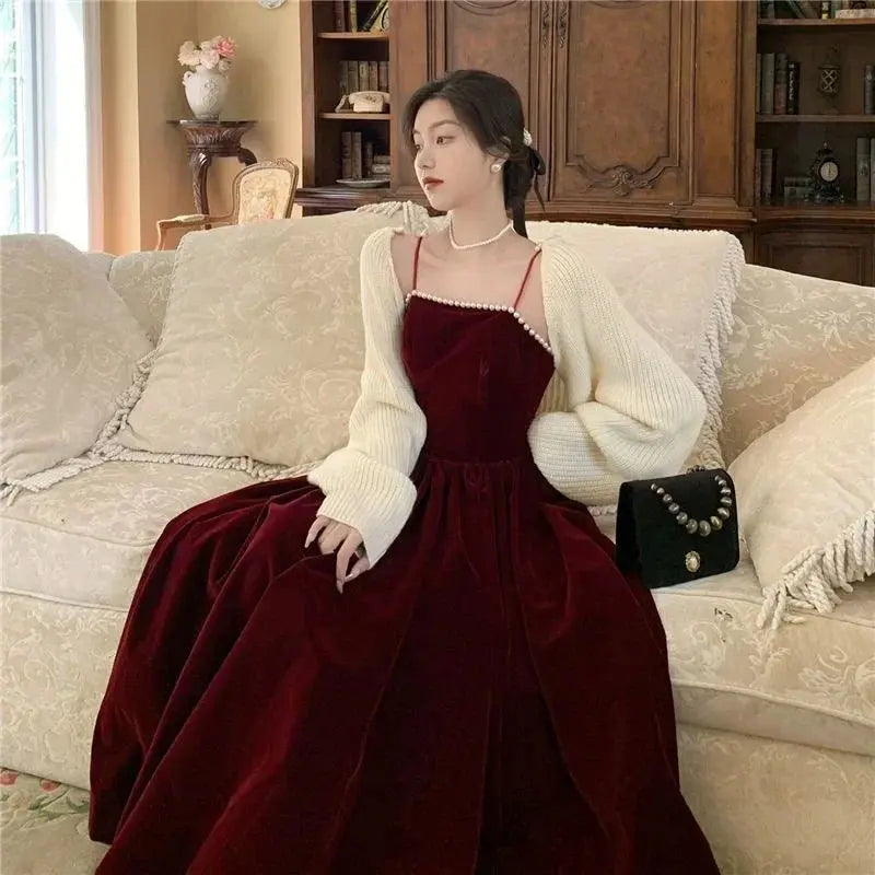 Close-up of luxurious velvet texture on the Midnight Whisper Midi Dress showcasing its rich color and softness.