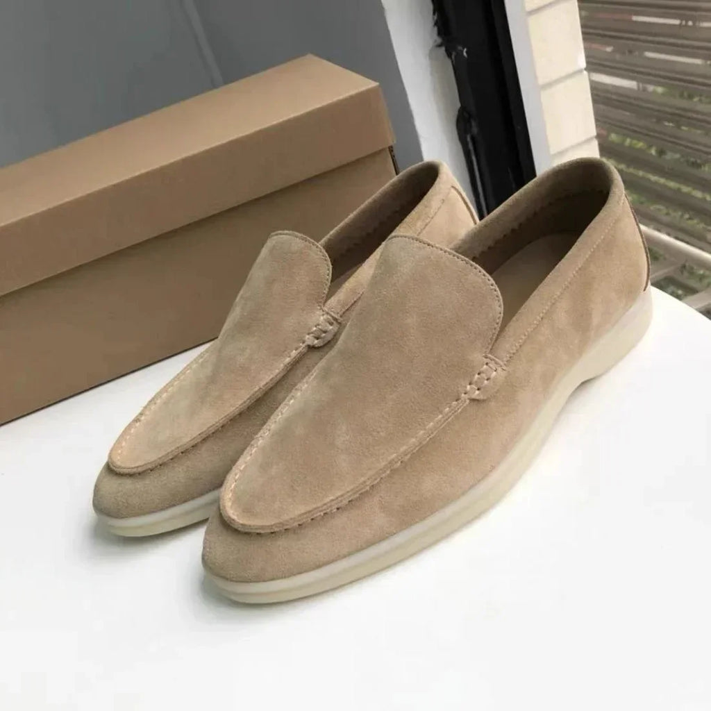 Close-up of premium genuine leather loafers showing buttery-soft texture and timeless slip-on design