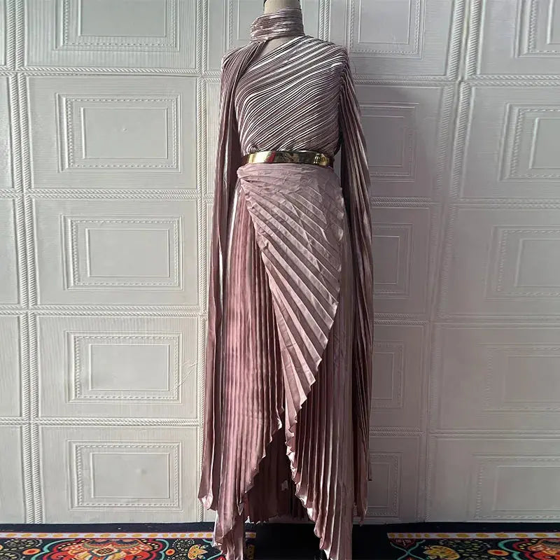 Back view of the Twilight Cascade gown highlighting the shawl-like batwing sleeves.