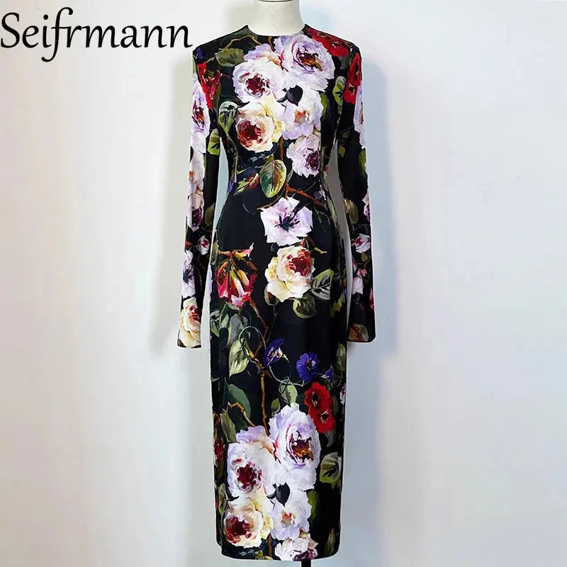 Close-up of luxurious silk fabric of the Midnight Floral Silk Dress, highlighting its smooth texture.
