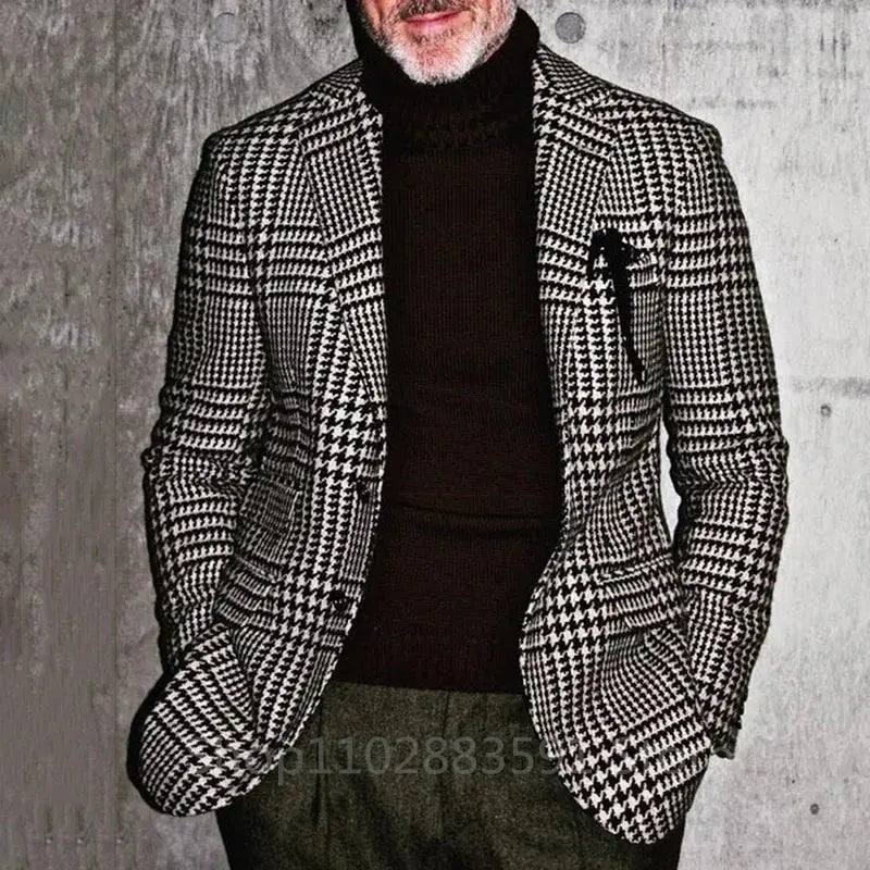 Close-up of houndstooth pattern on a stylish men's blazer, showcasing its sharp contours.