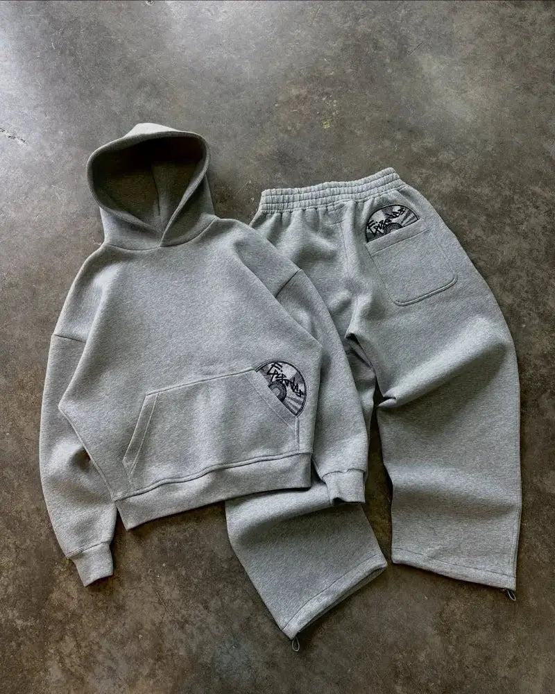 Zipper fly detail of Urban Pulse Tracksuit pants, ensuring secure fit and effortless movement.