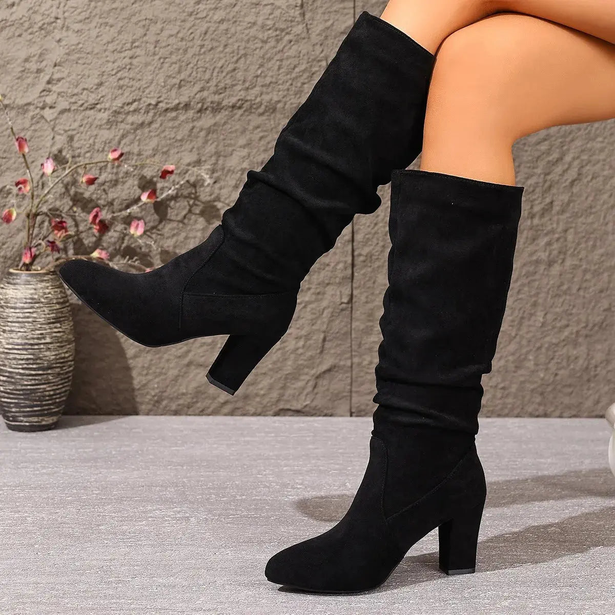 Versatile ankle boots featuring structured thick heels for stability and style.