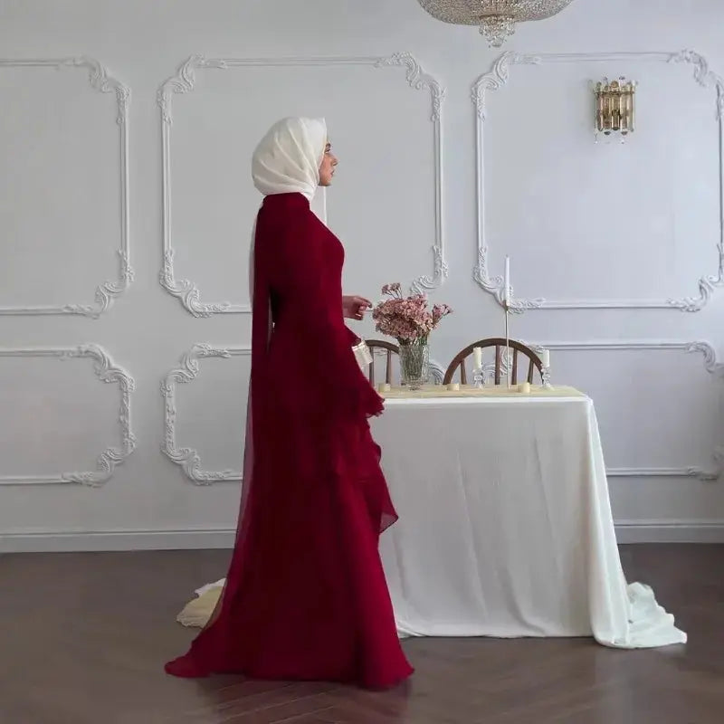 Back view of the Abaya, emphasizing its seamless movement and tailored fit.