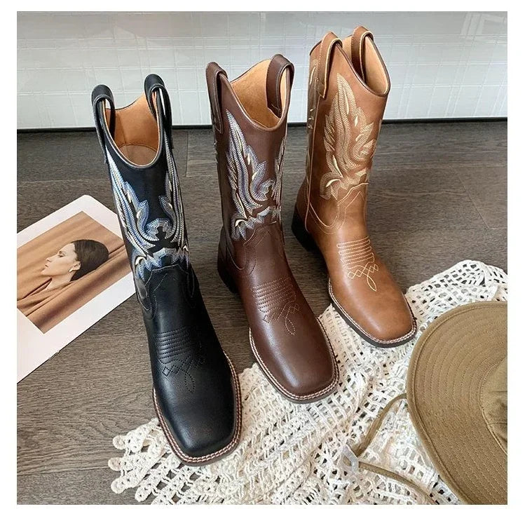 Genuine leather cowboy boots with embroidered shaft and easy slip-on construction