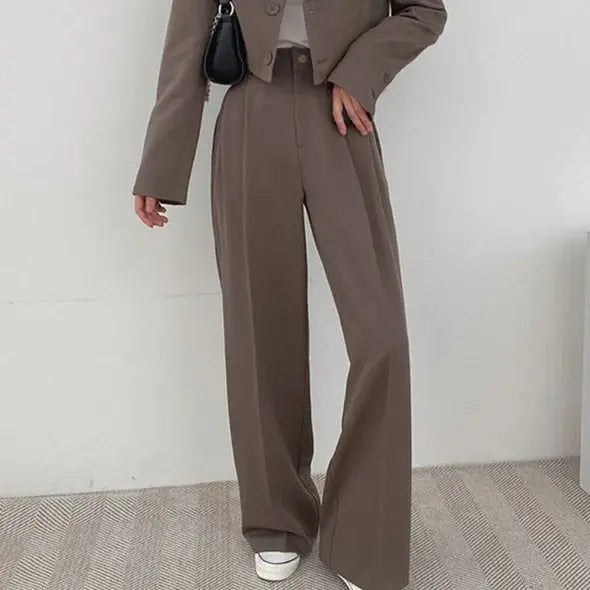 Wide-leg pants of the power suit showcasing premium polyester and cotton blend for comfort.