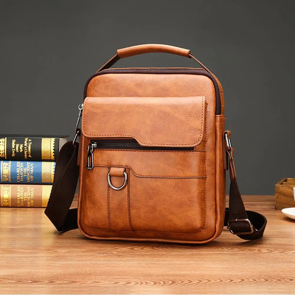Urban Explorer bag front view displaying vintage brown leather finish and pocket layout