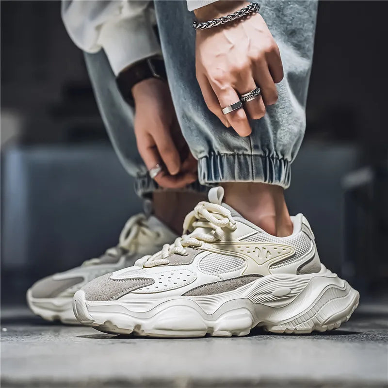 Black breathable mesh sneakers with anti-slip rubber sole for men shown from side angle