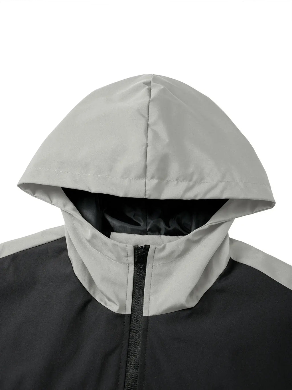 Lightweight Wind Whisperer jacket in black, showcasing its windproof design for chilly weather.