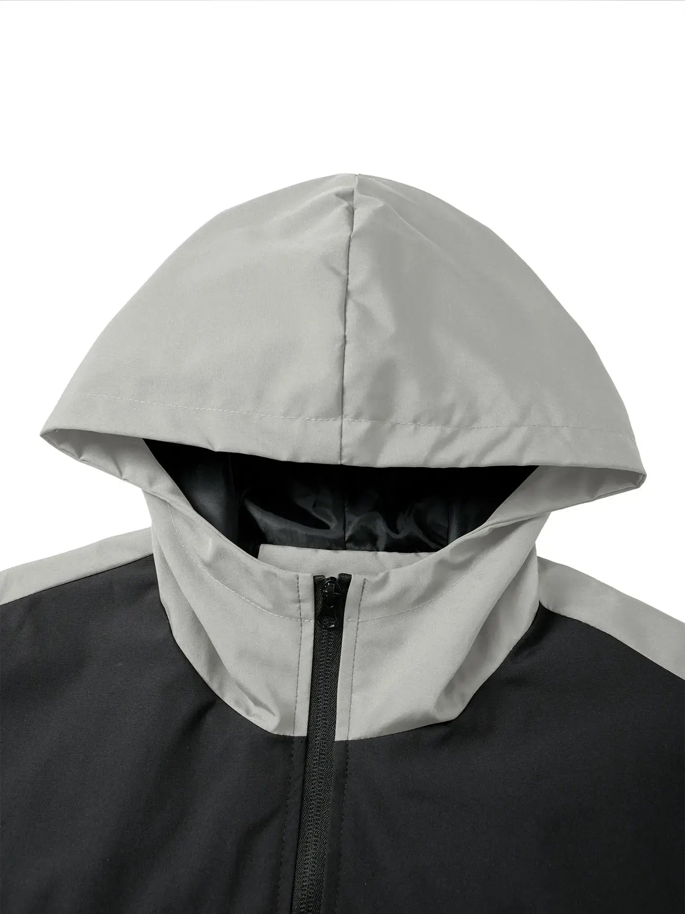 Lightweight Wind Whisperer jacket in black, showcasing its windproof design for chilly weather.