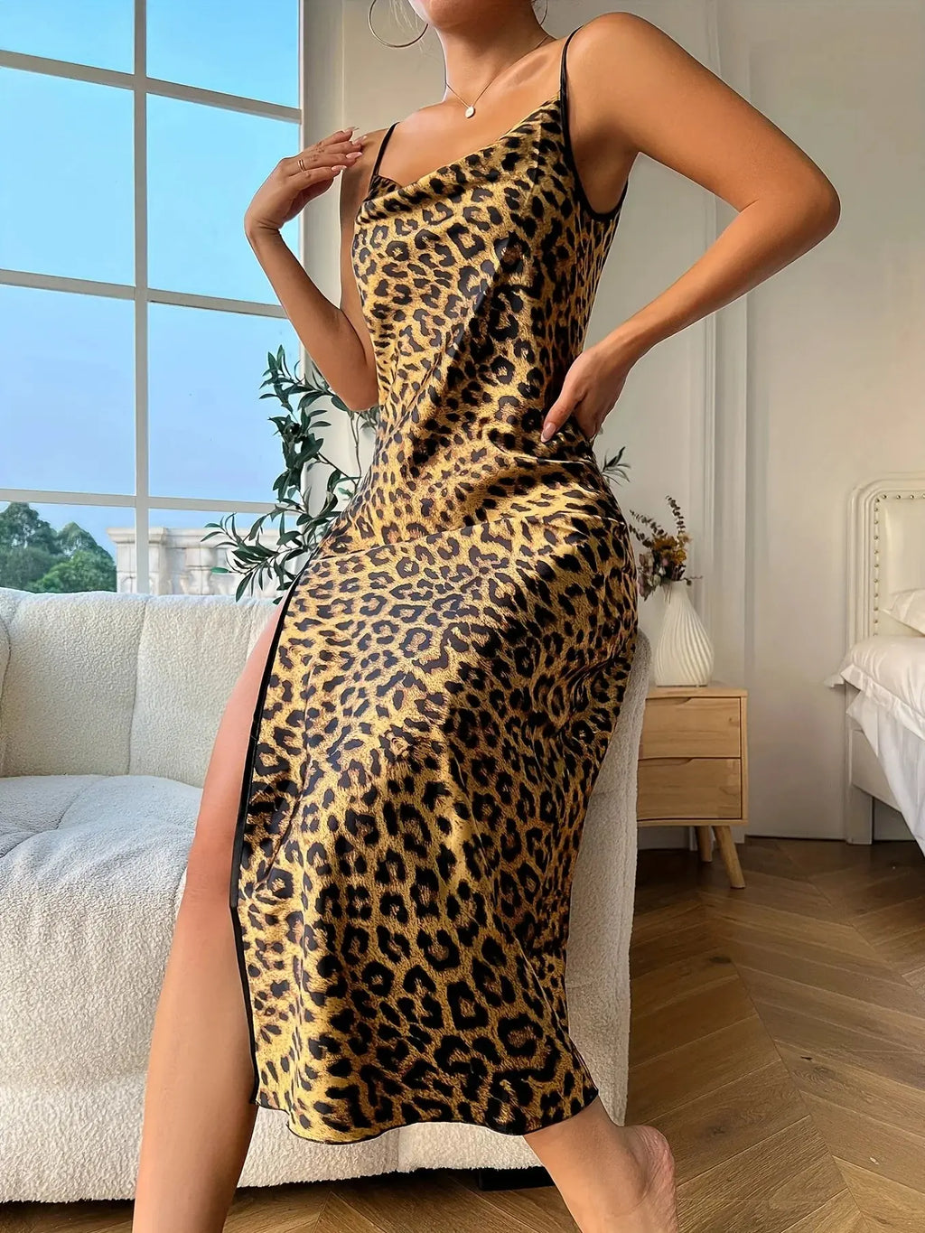 Model wearing Midnight Prowl Chemise, highlighting flattering mid-calf slit and alluring silhouette.
