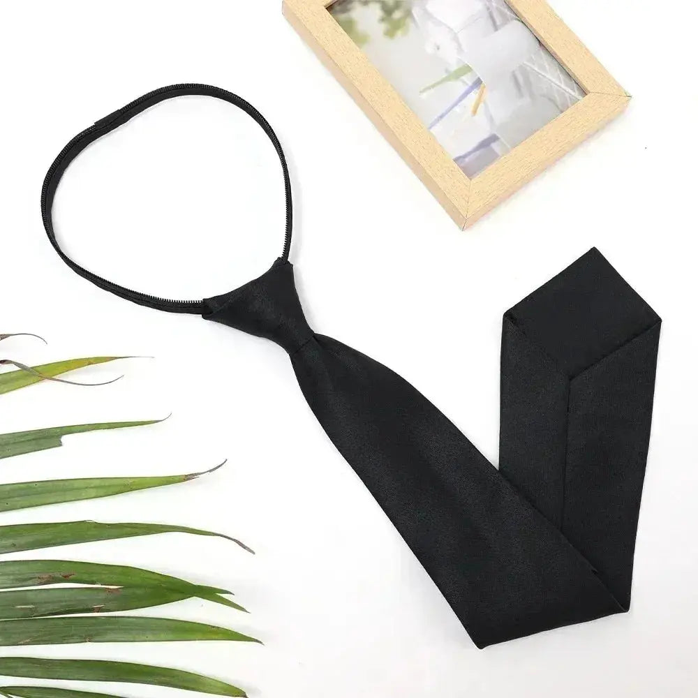 High-quality black tie featuring a deep hue, a statement accessory for any formal event.