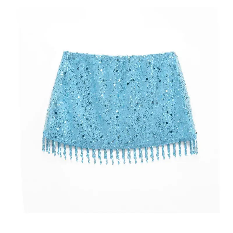 Full outfit display featuring the Pearl Fringe Halter with a matching skirt, ideal for night out.