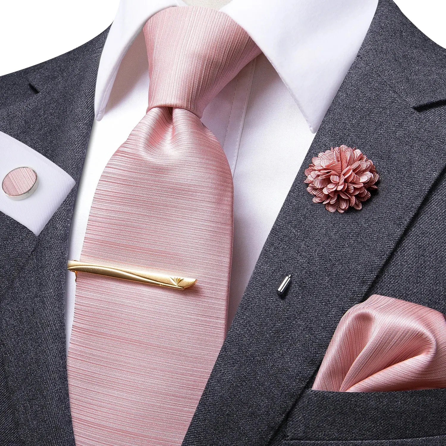Cufflinks and handkerchief displayed alongside the tie.