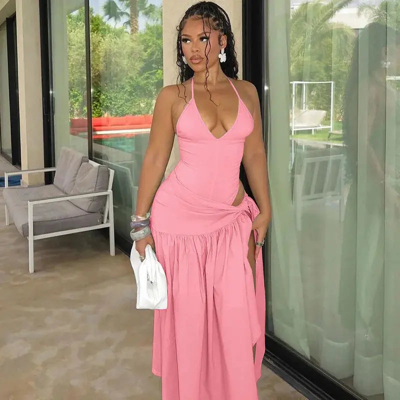 Lace-up skirt paired with a deep V-neck jumpsuit for evening wear.