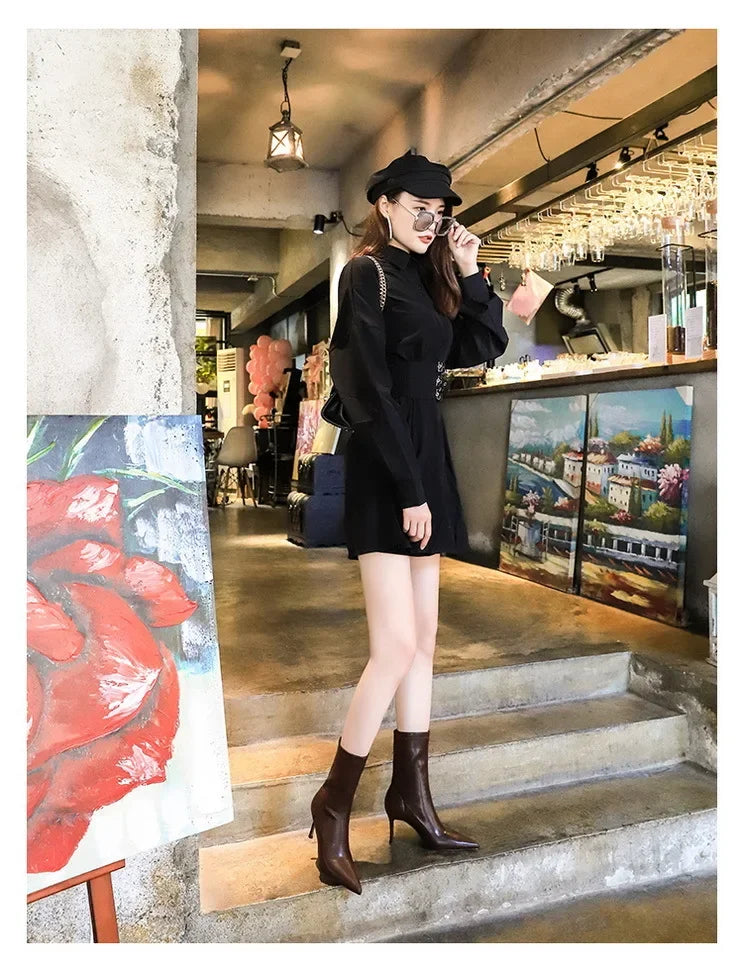 Stiletto heel mid-calf boots with polished leather exterior