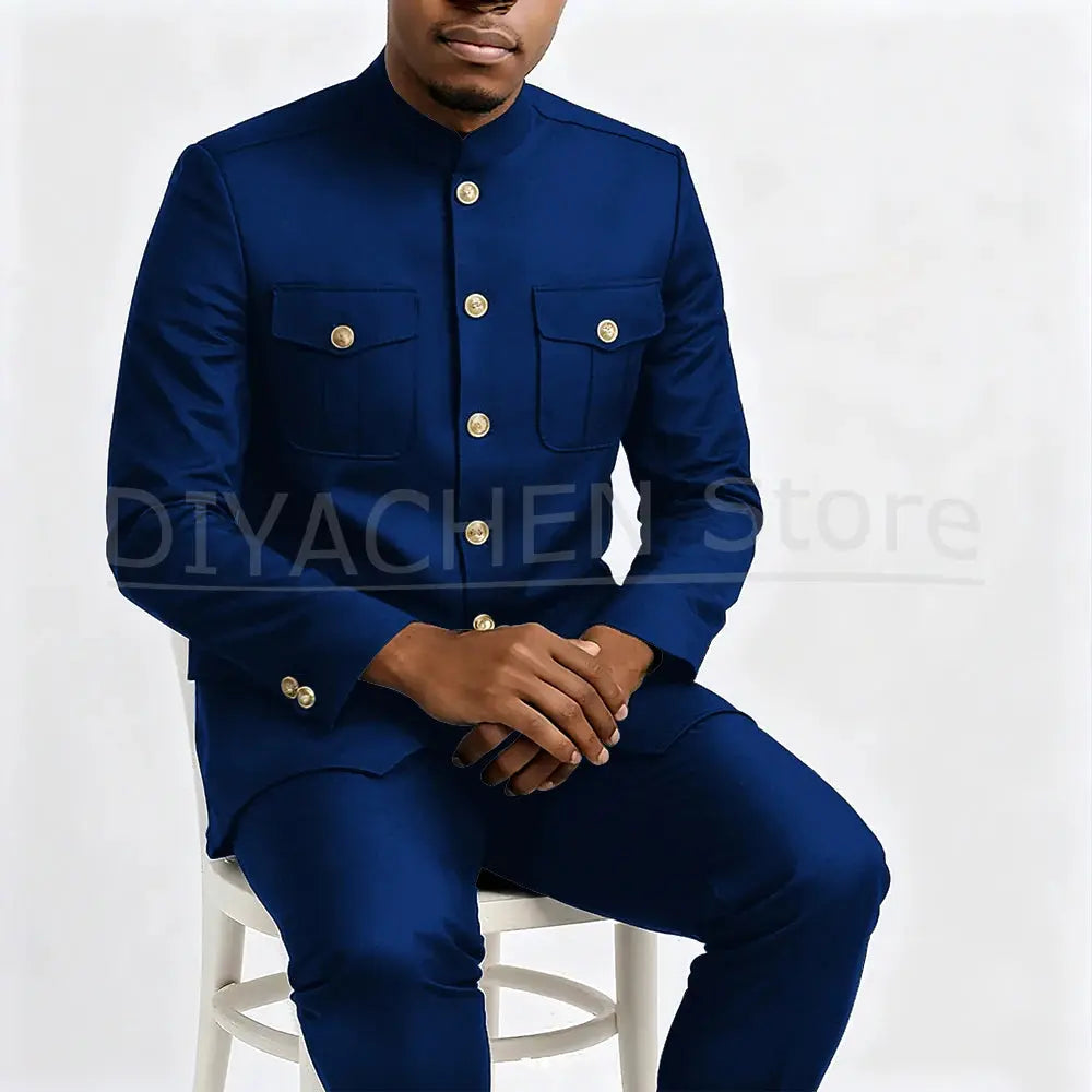 Model posing in the suit at a wedding venue.