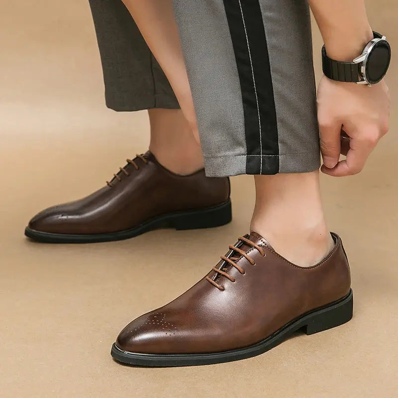 Elegant brown leather oxfords perfect for weddings and business events.