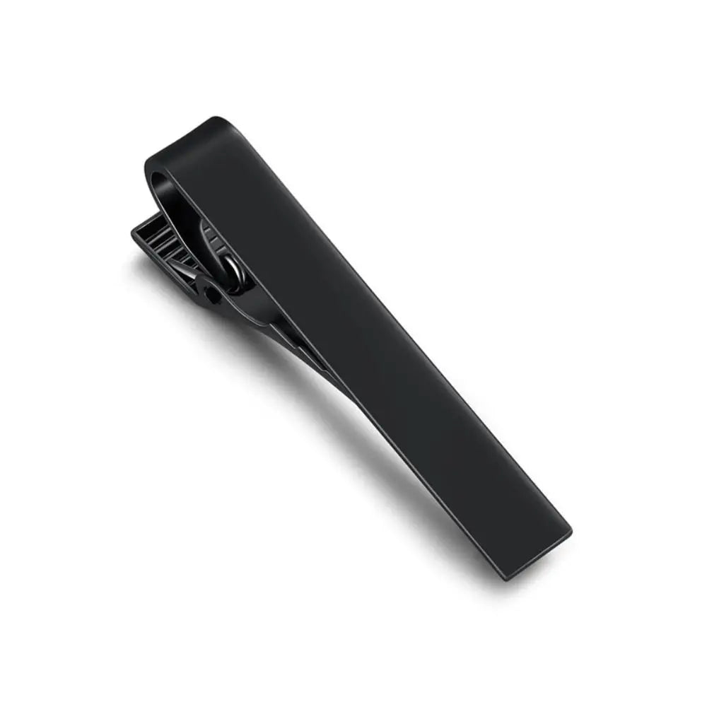 Sleek design of a tie clip, adding a sharp edge to formal attire.