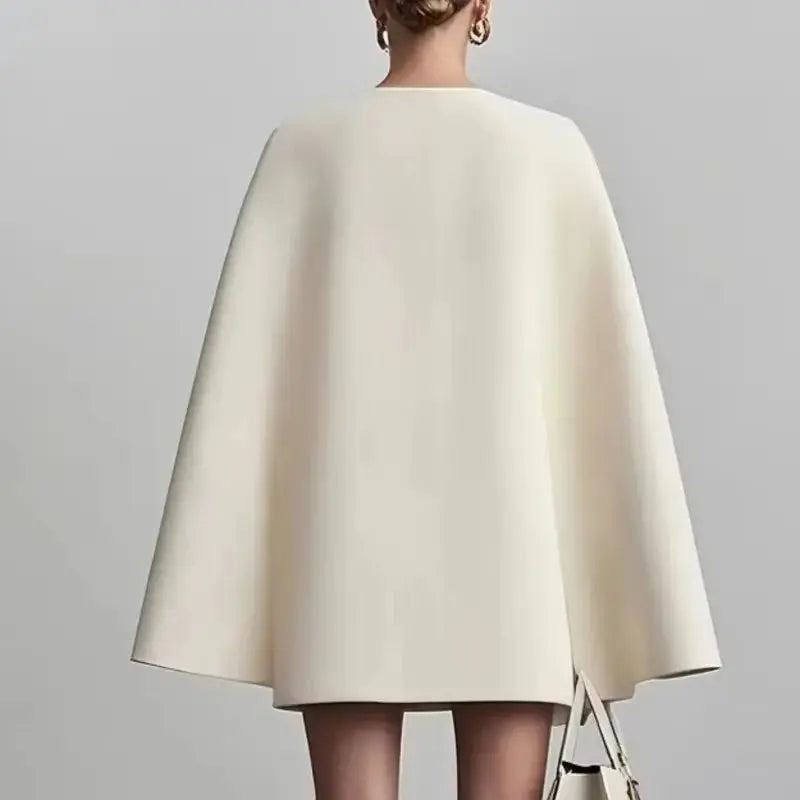Side view of the versatile women's cloak blazer, ideal for autumn office wear.