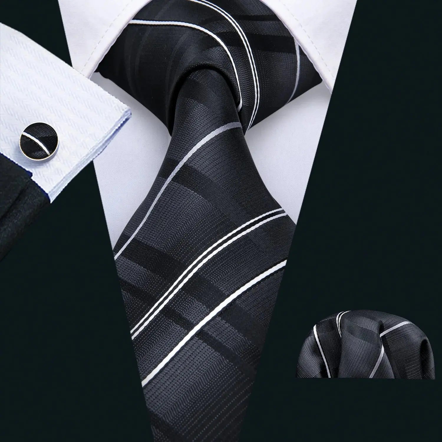 Refined black silk tie with matching accessories for men