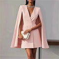 Full-length image of the black cloak blazer, transitioning from office to evening look.