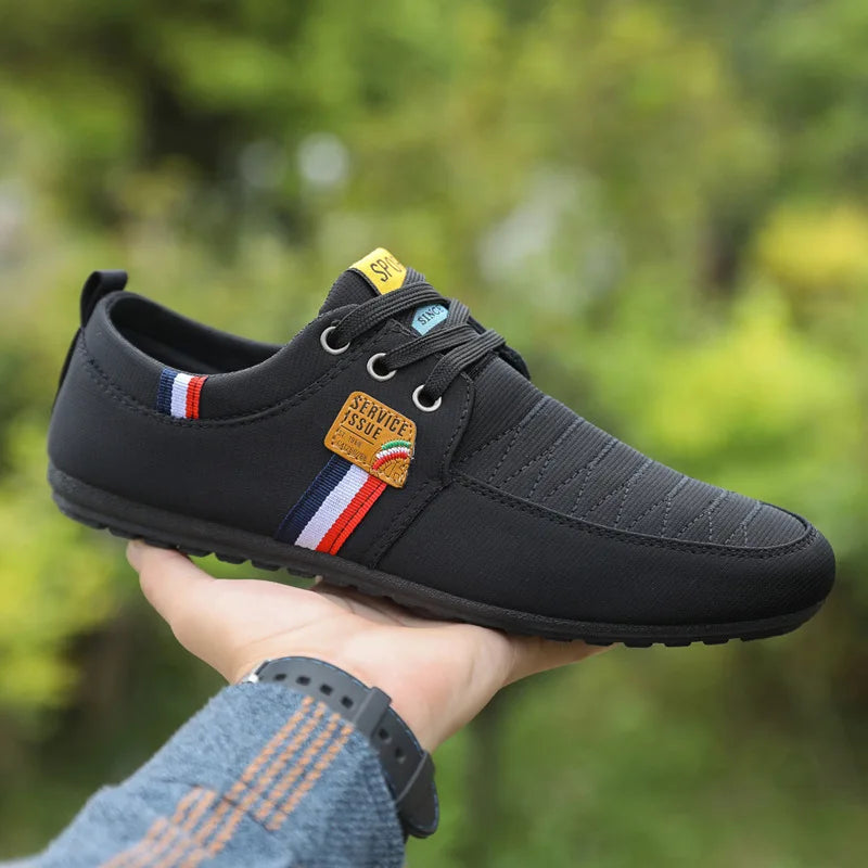 Stylish sneakers with breathable mesh lining, perfect for urban driving and daily wear.