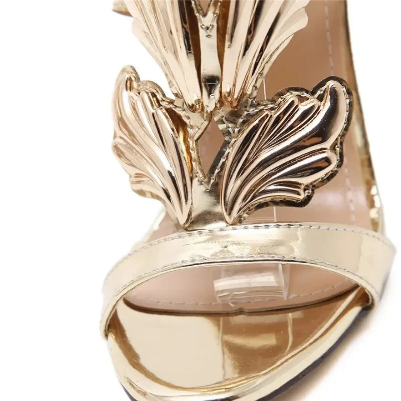 Close-up of adjustable double buckle detail on Gold Wings Stiletto for a secure fit.
