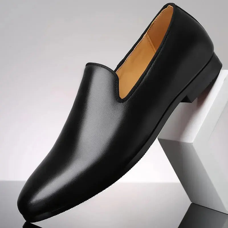 Luxe leather loafers in black, showcasing a sleek design for elegant men's footwear.