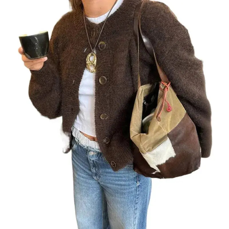 Fireside Charm Cardigan showcasing boho chic style, perfect for layering over dresses.