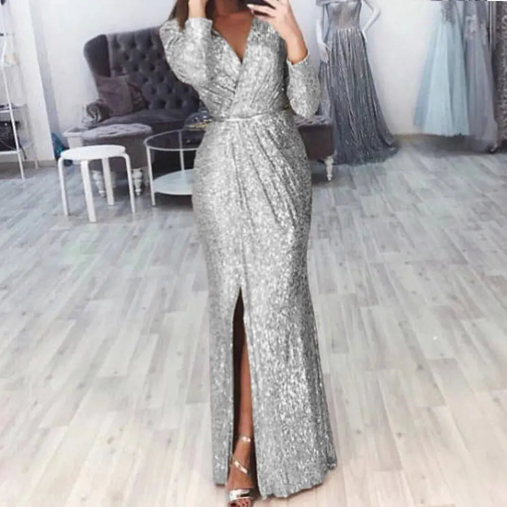 Detail of the gown's ruched glitter fabric, enhancing the silhouette and texture.