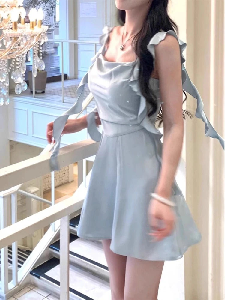 Side view of slim fit Apricot Whisper dress, accentuating the silhouette.