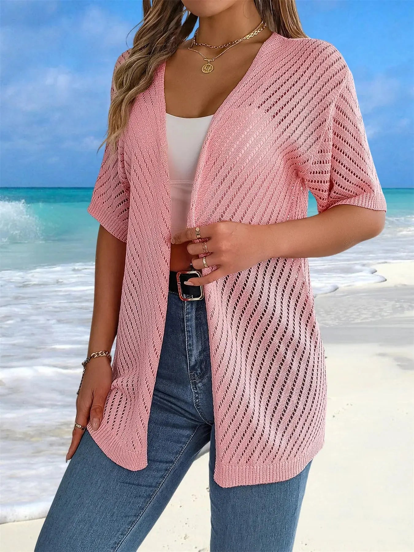 Breeze Whisperer Crochet Cardigan draped over a casual tank top for effortless style.