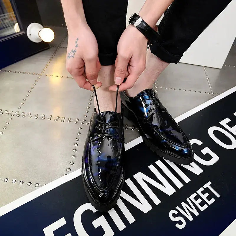 Detail of the glossy patent leather on Midnight Gloss Loafers.