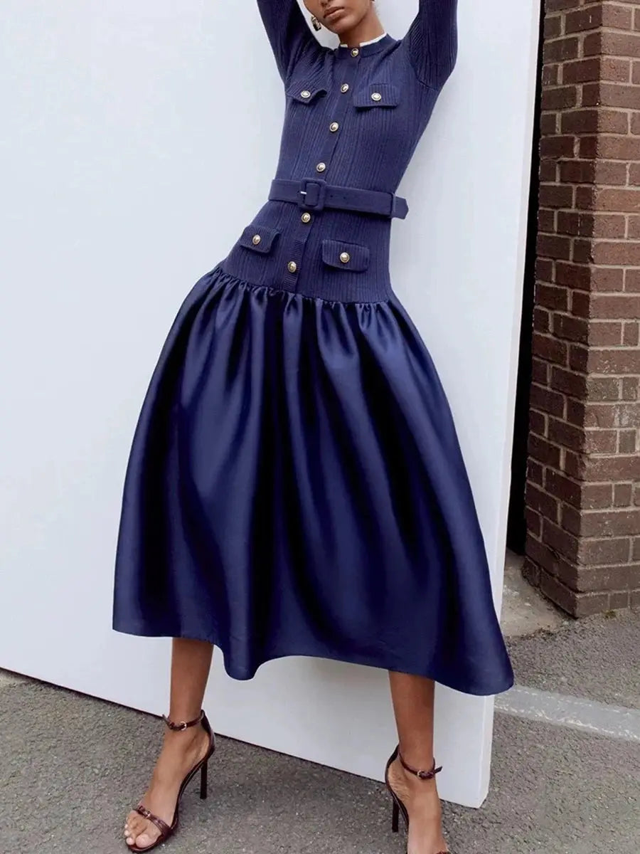 Model wearing the mid-calf elegant knit dress, perfect for professional settings.