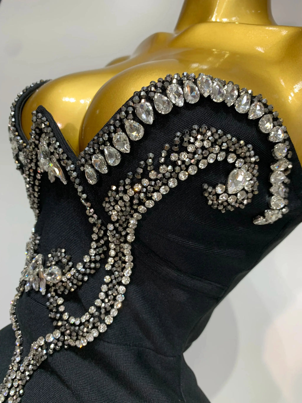 Full-length shot of the figure-hugging gown, ideal for red carpet occasions.