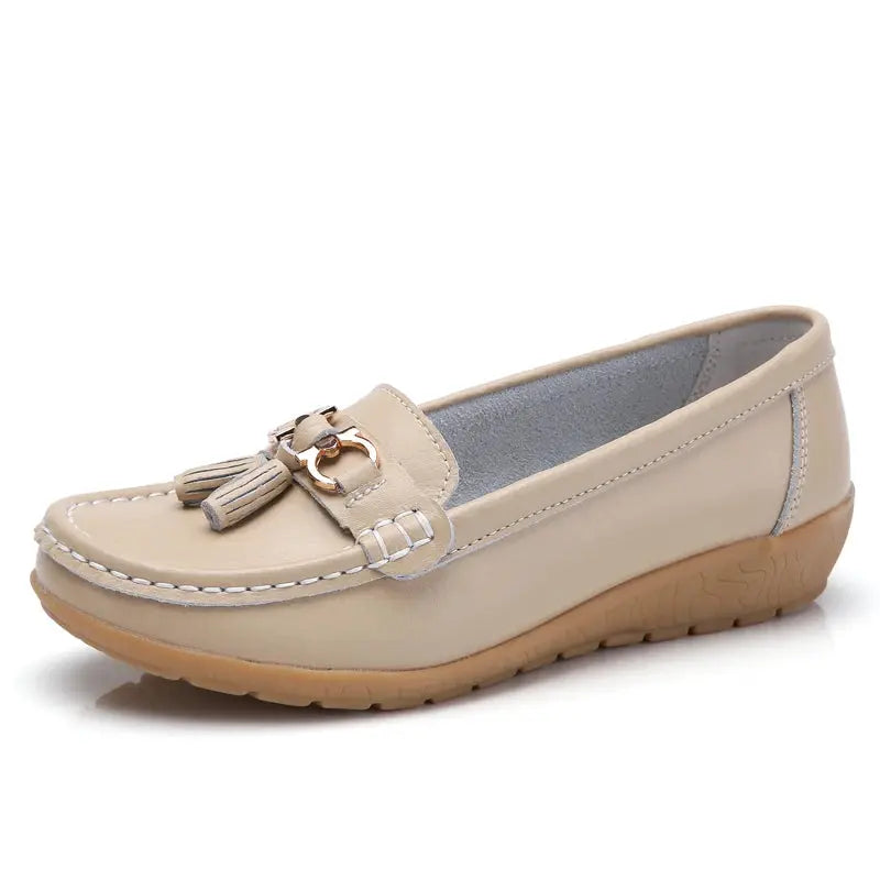 Effortless style white slip-on shoes with soft PU lining.