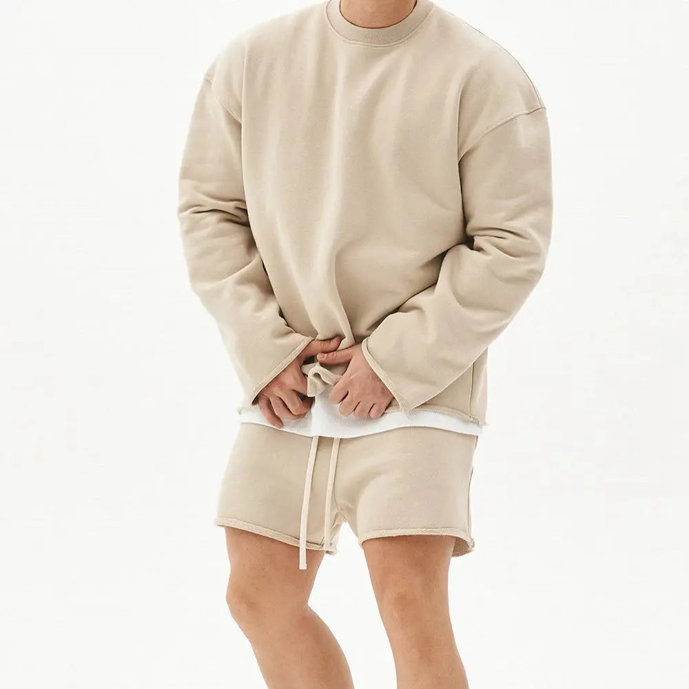 Men's running tracksuit featuring a streamlined fit and integrated drawstrings.