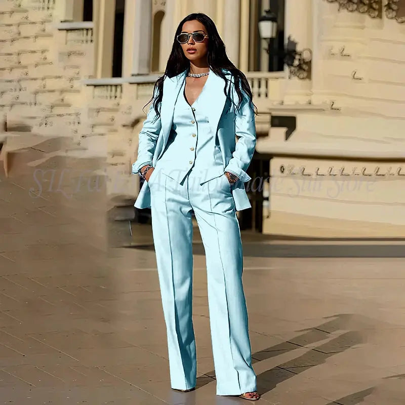 Three-piece suit laid flat, highlighting its tailored design.