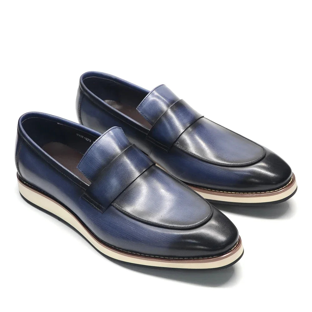 Black genuine leather penny loafers with classic slip-on design and premium stitching detail