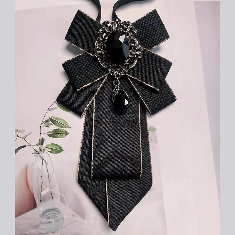 Minimalist bow tie accessory in neutral tone, perfect for adding personality to professional and casual ensembles