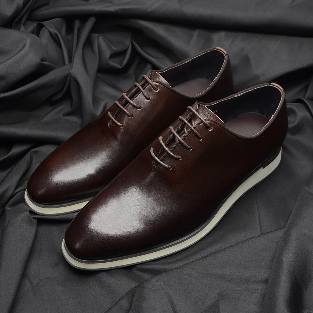 Black leather Oxford dress shoes with sheepskin insole and 2.8cm heel, handmade by skilled artisans