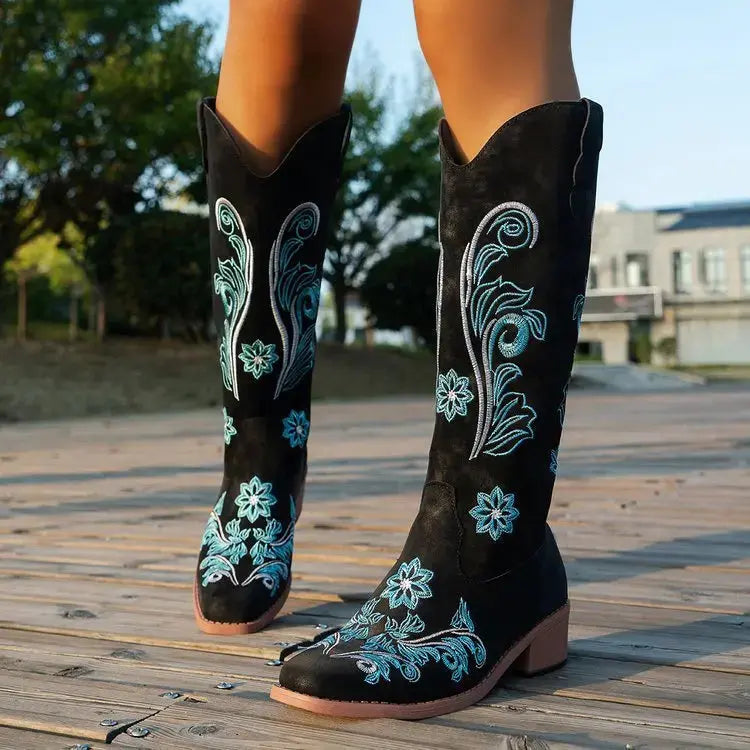 Waterproof Western boots with artisan embroidered details and comfortable fabric insole