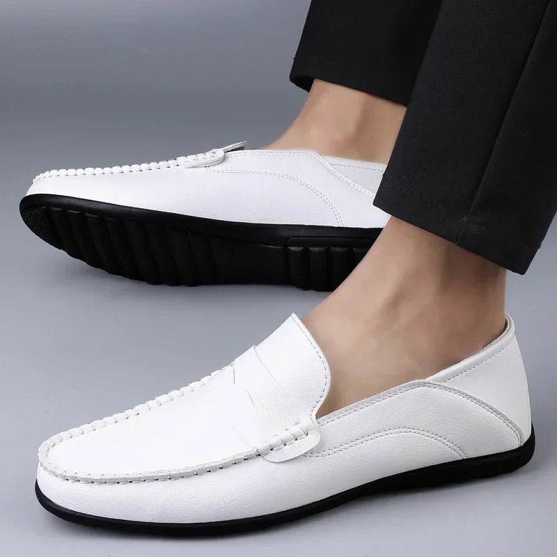 Side view of premium split leather loafers showing breathable construction and refined texture