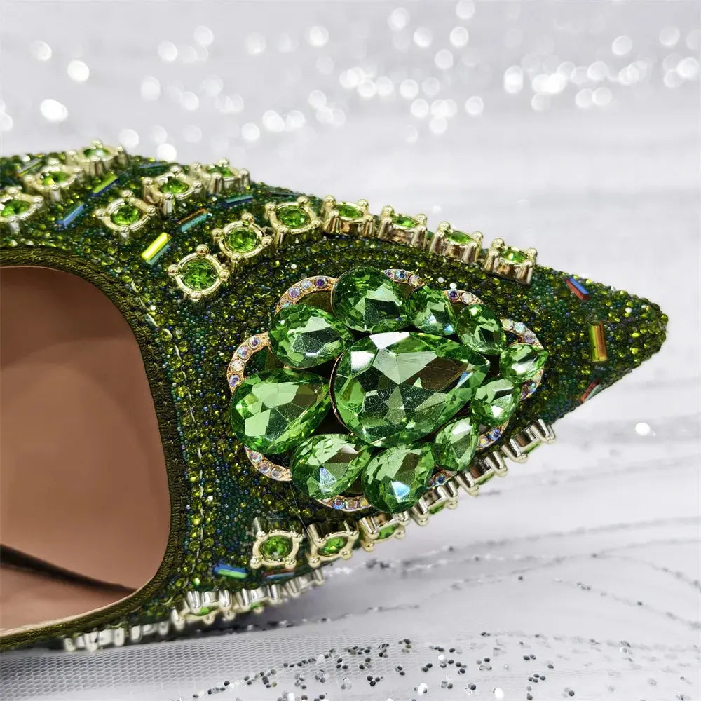 Matching rhinestone handbag complements the green heel set.