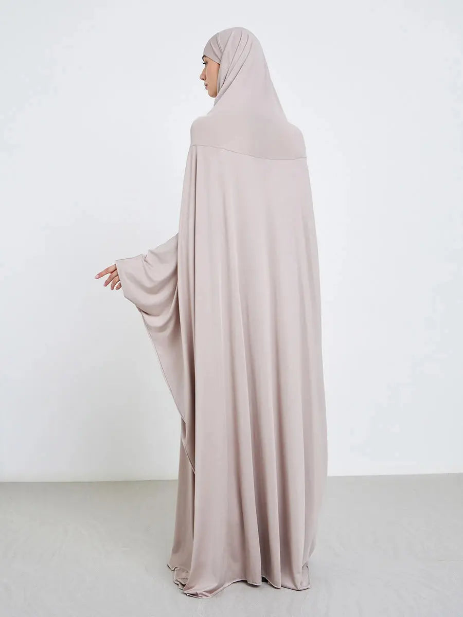 Soft, breathable fabric of the Serene Grace Abaya, perfect for prayer.