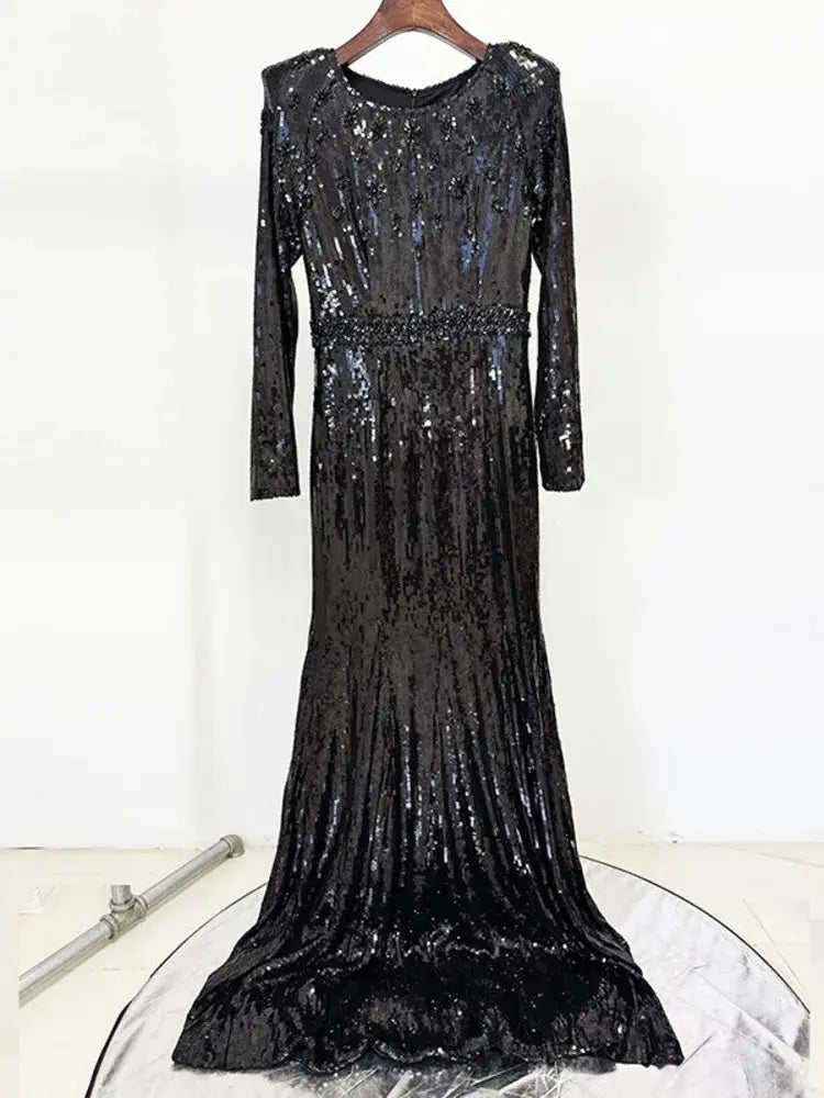 Full sleeves of the sequined gown, highlighting comfort and sophisticated style.