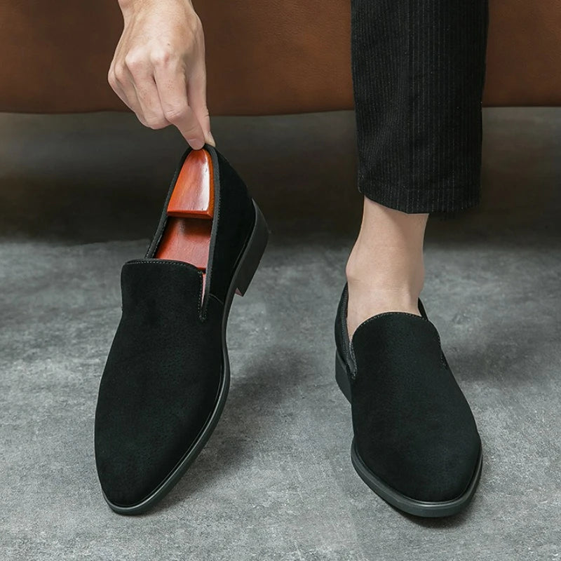 Elegant red-bottom suede loafers with streamlined pointed silhouette for modern gentlemen