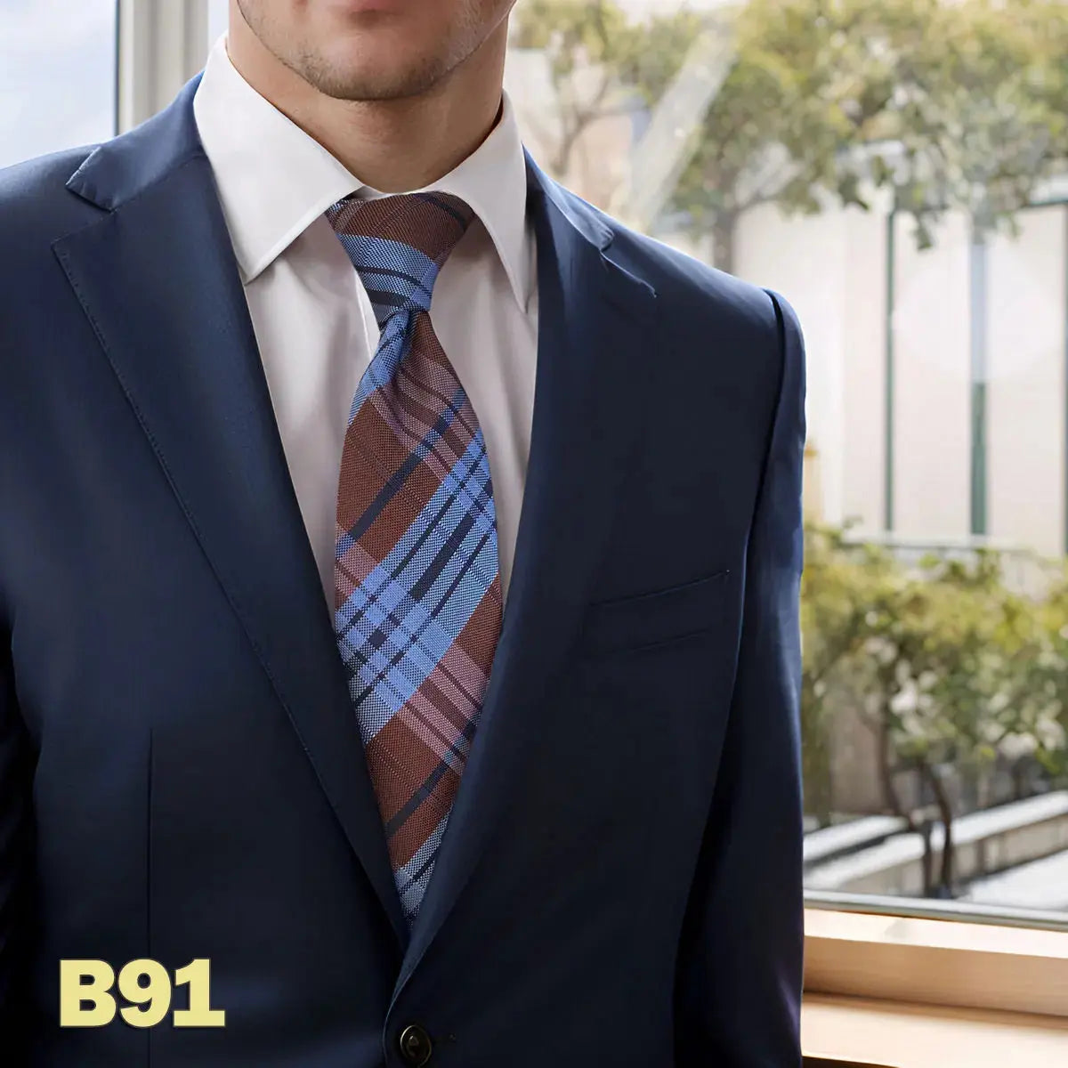 Elegant navy blue tie with sharp jacquard weave, perfect for board meetings.