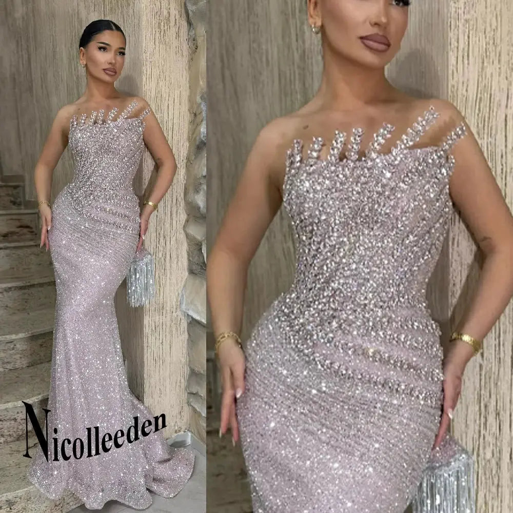 Twilight Shimmer beaded evening gown with delicate detailing and a flattering silhouette.